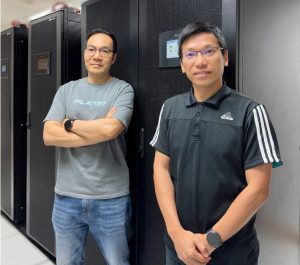 Winson and Jack from IUS adopt the new UPS system in ICTO’s data center.